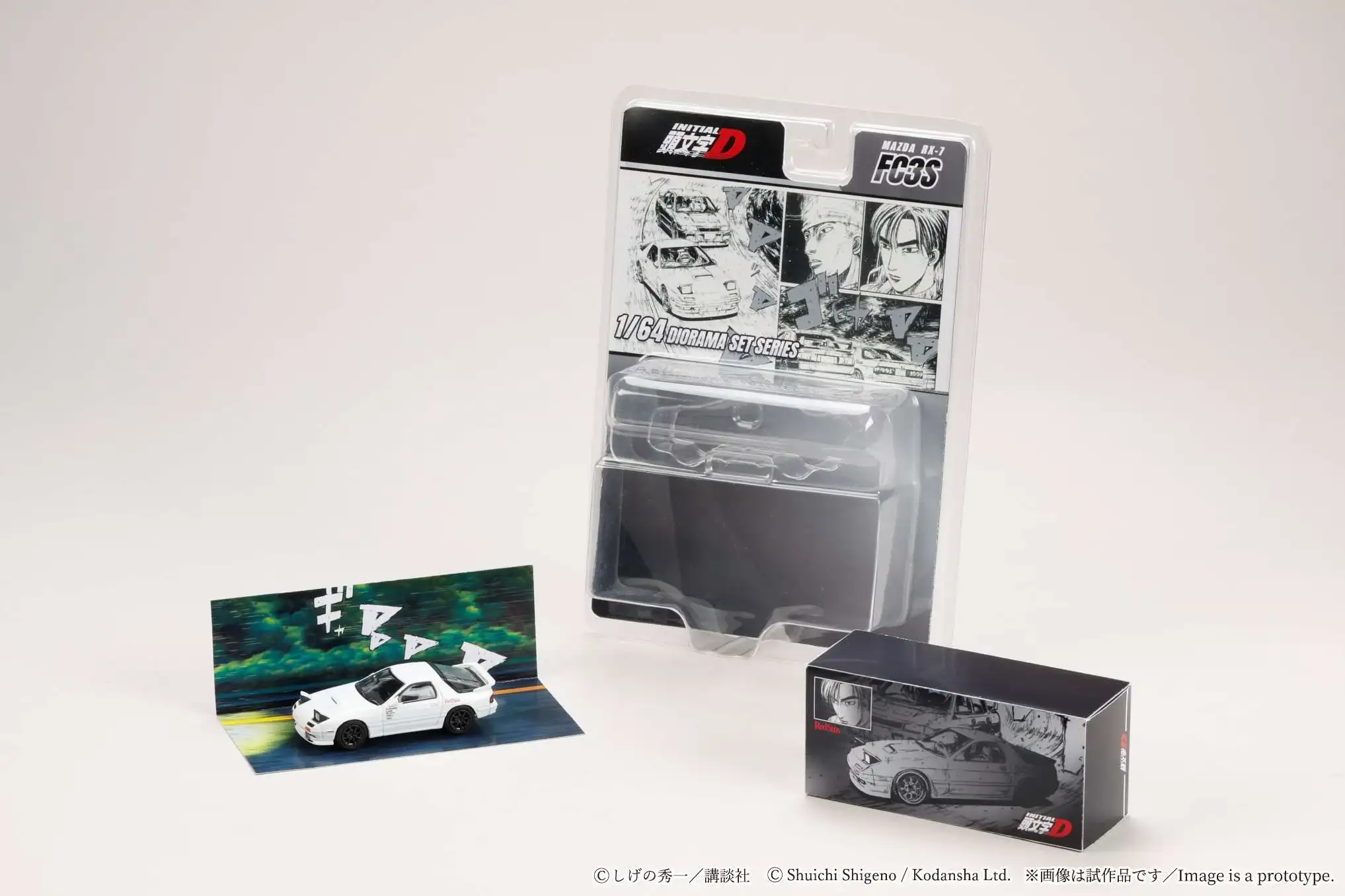 Hobby Japan 1:64 MAZDA RX-7 (FC3S) RedSuns / Initial D Ryosuke Takahashi VS Kyoichi Sudou - Image 2