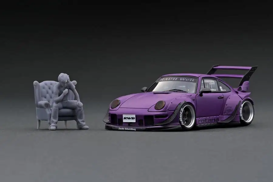 Ignition Model 1:43 Scale IG online shop/event special! IG2322 RWB 993 Rotana Matte Purple With Mr. Nakai sitting on sofa