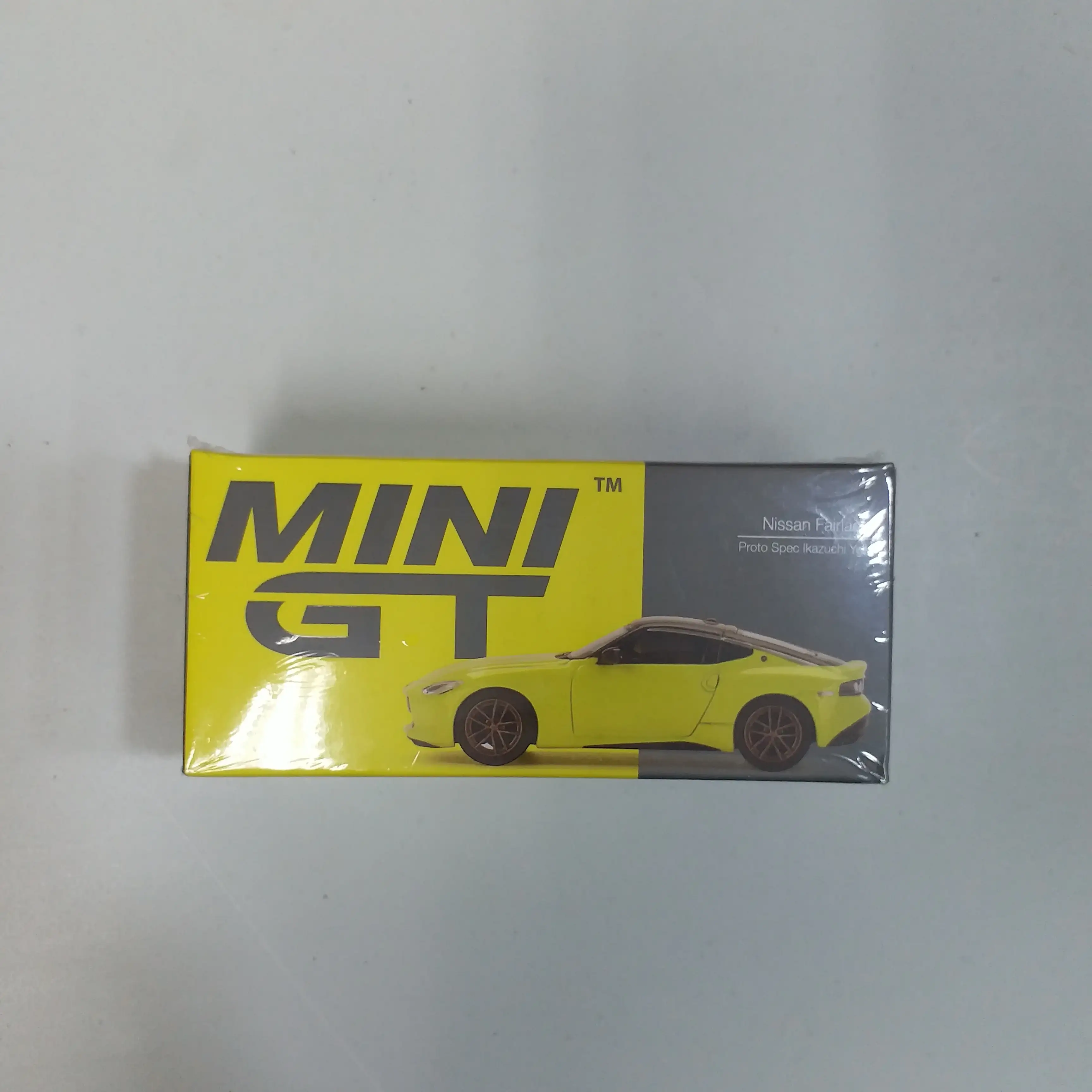 Mini GT #414 Nissan Fairlady Proto Spec Ikazuchi Yellow 1:64 scale - Image 2