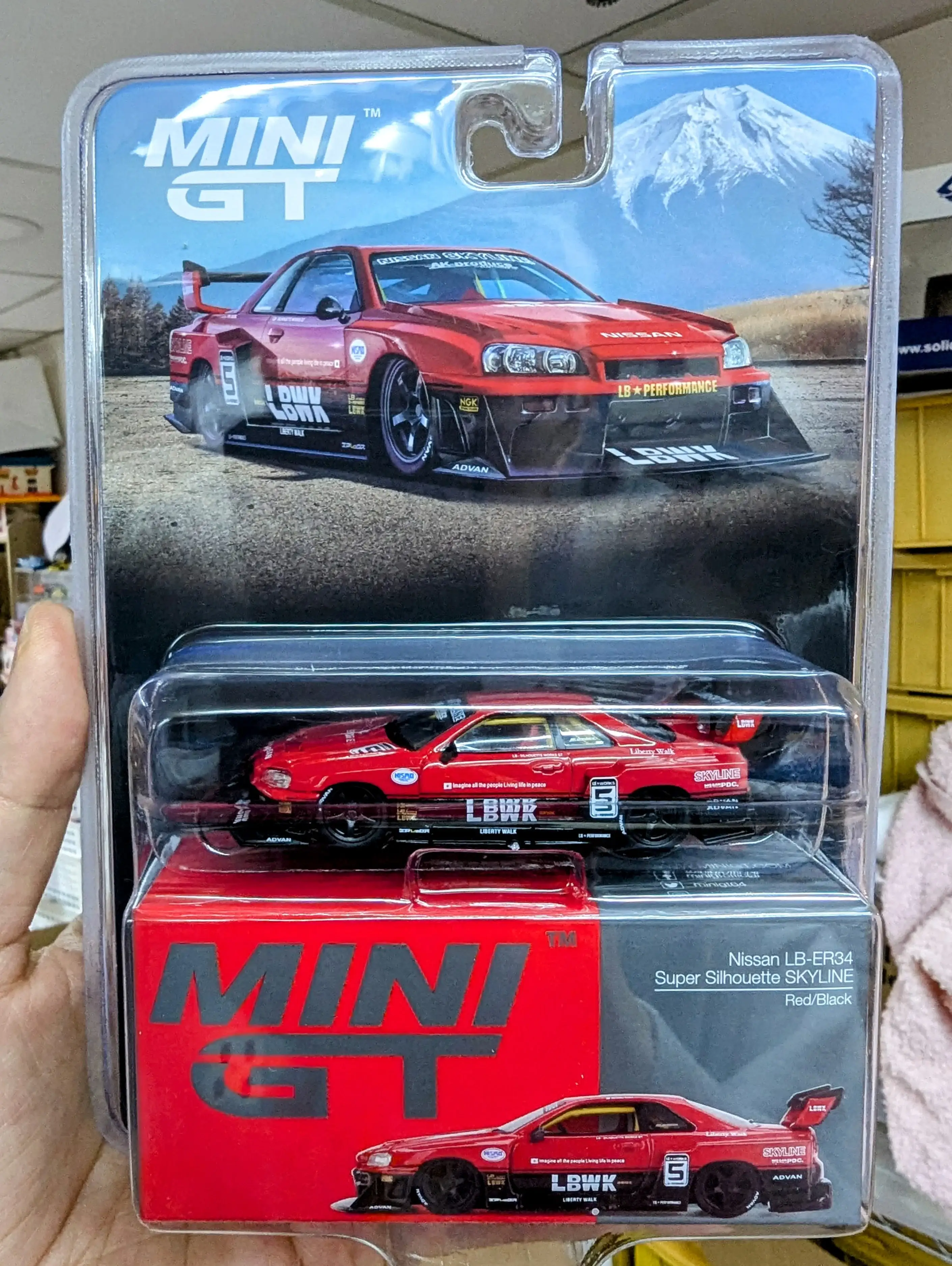 MINI GT x Mijo #843 Nissan LB-ER34 Super Silhouette SKYLINE Red/Black Blister Packing