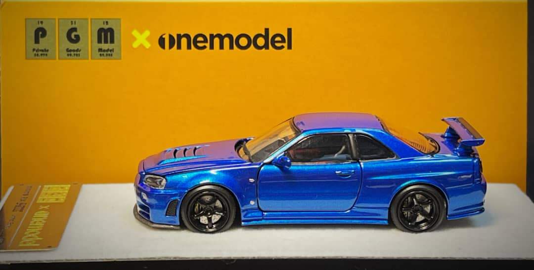 PGM X One Model 1:64 Scale Nissan Skyline GTR R34 Nismo Z Tune Metallic Blue - Image 2