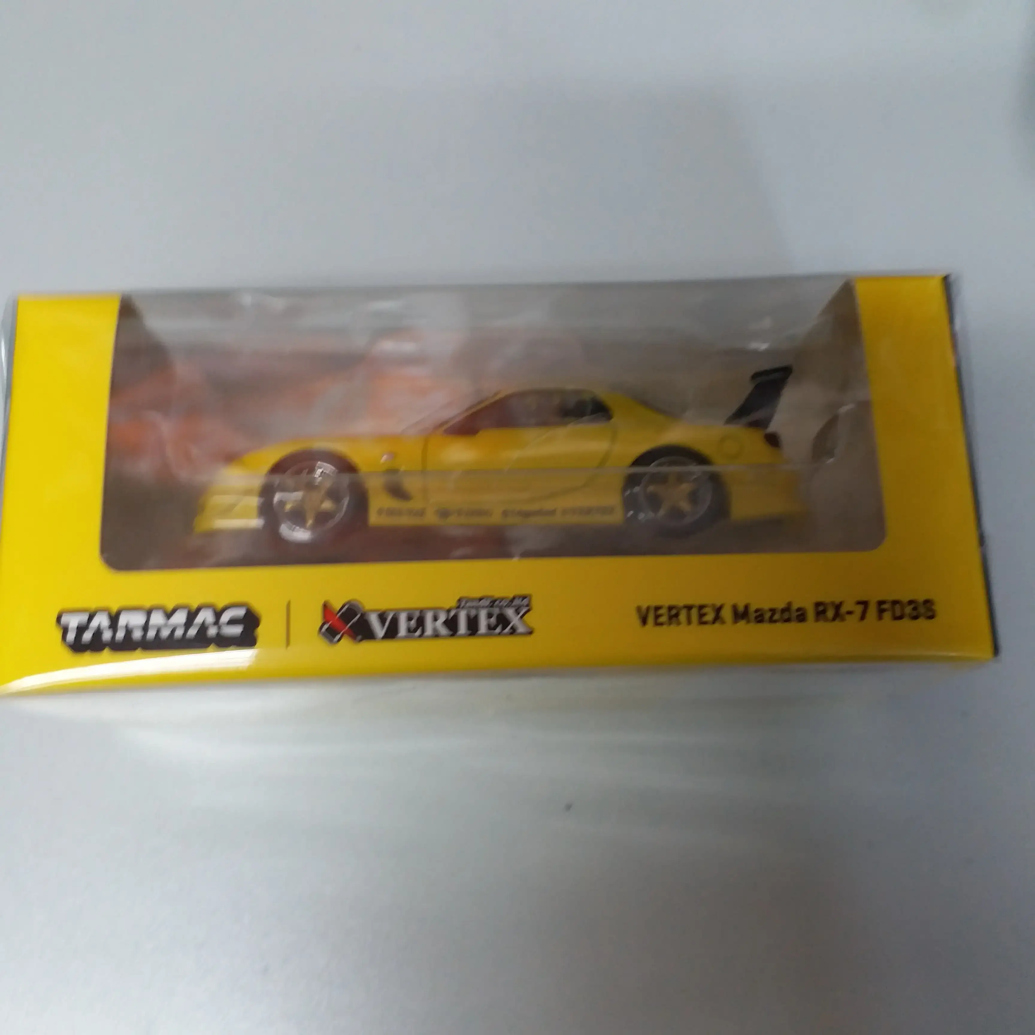 Tarmac Works 1:64 Scale VERTEX Mazda RX-7 FD3S Yellow Metallic - Image 3